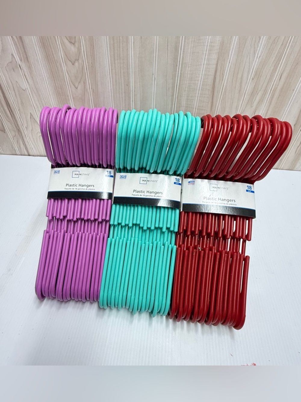 Set of Colorful Plastic Hangers – Purple, Teal & Red (3 Packs)